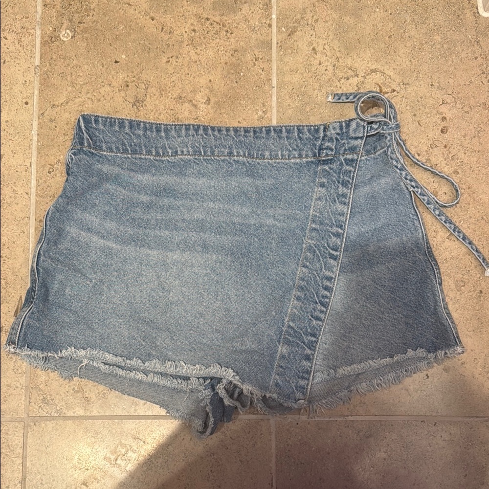 Free People we the free emmy denim wrap skort in light blue wash